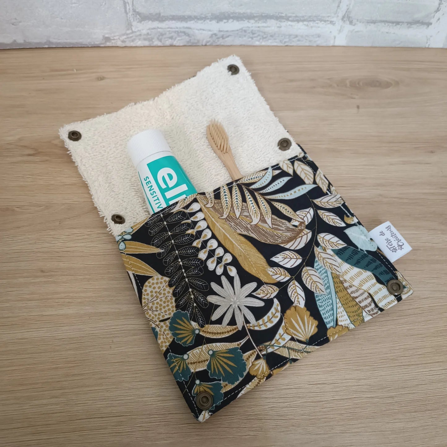 Étui à brosse à dents et dentifrice motif feuillage bronze et vert