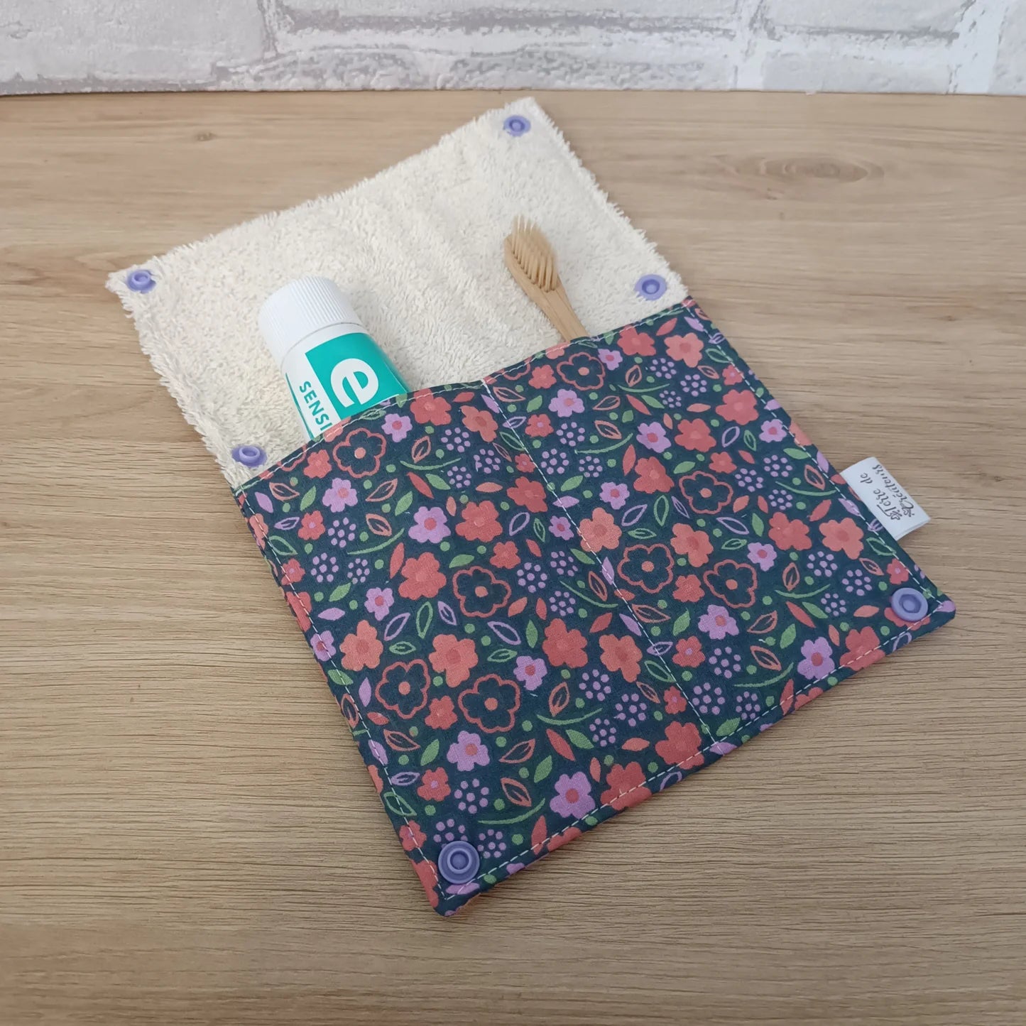 Étui à brosse à dents et dentifrice motif fleurs orange et mauve