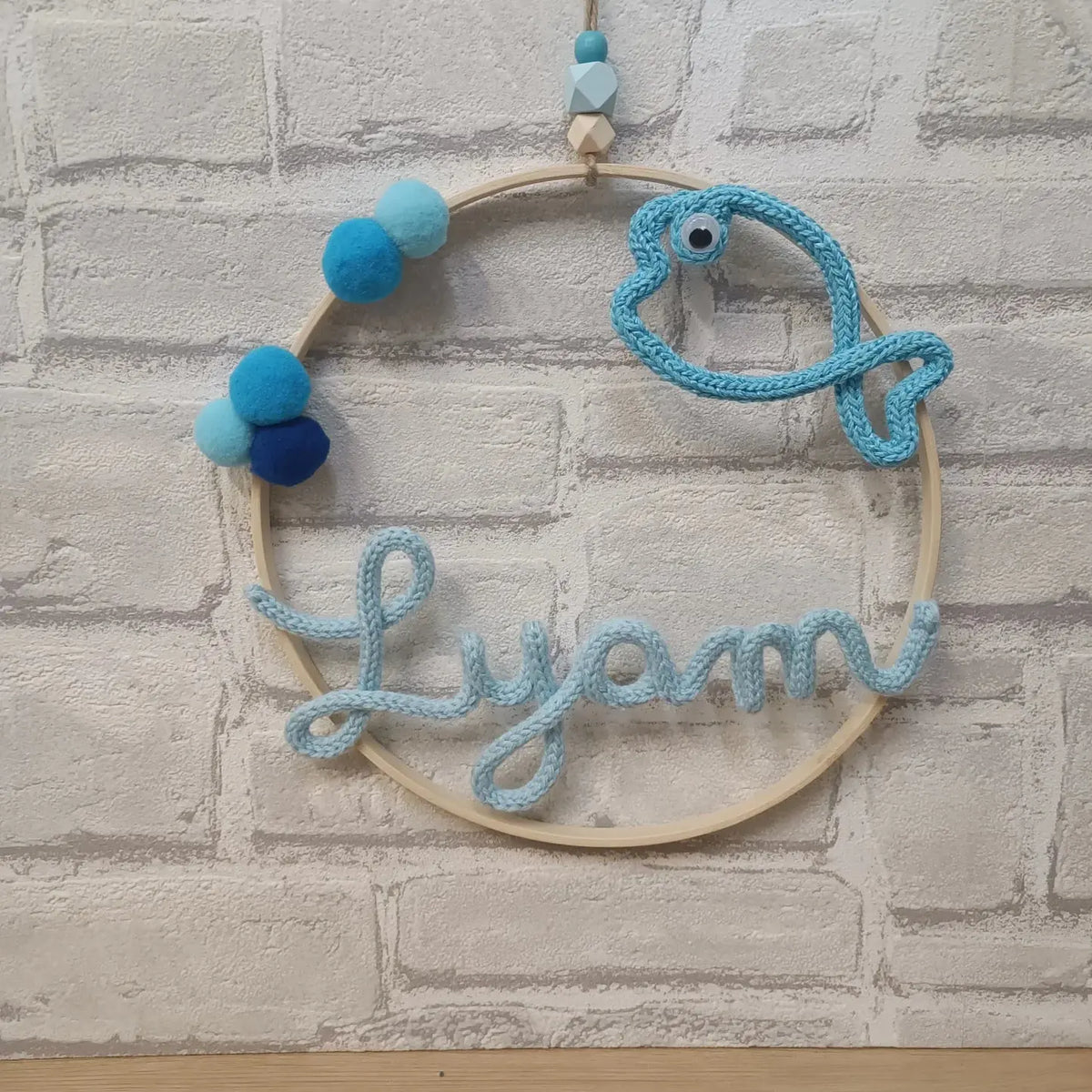 Prénom en tricotin bleu Lyam