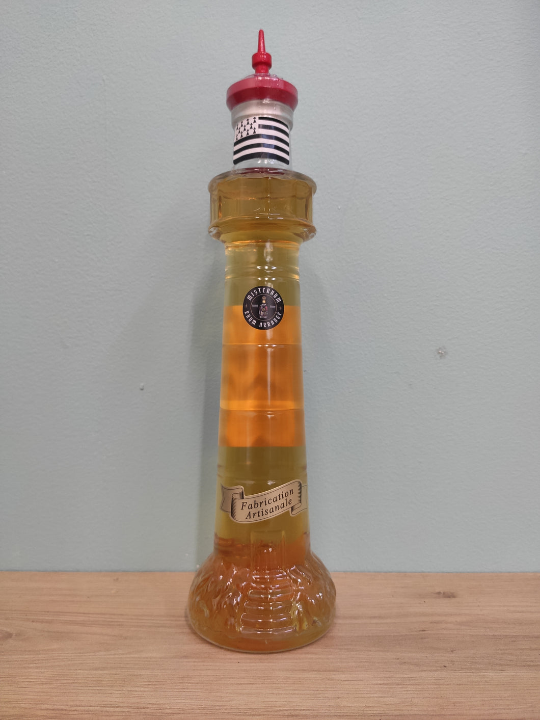 Rhum arrangé Ananas Banane Flambée bouteille phare
